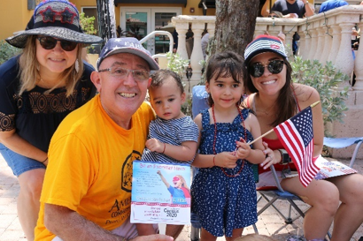 Families loved the hand fans at the parade